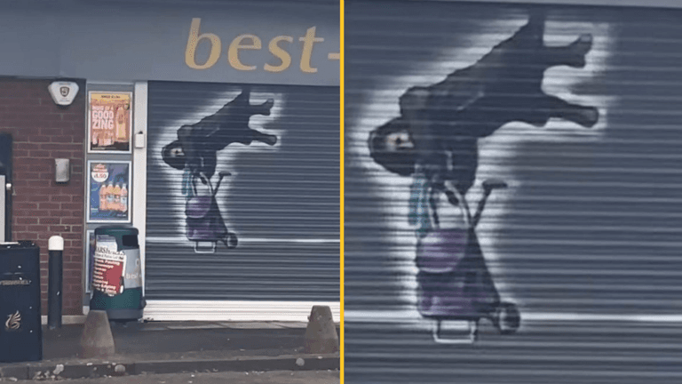Shop honours woman who was left dangling mid-air after being lifted up by shutters Shop honours woman who was left dangling mid-air after being lifted up by shutters