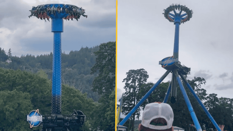 Terrifying moment theme park ride halts in mid-air leaving 28 people stuck upside down Terrifying moment theme park ride halts in mid-air leaving 28 people stuck upside down