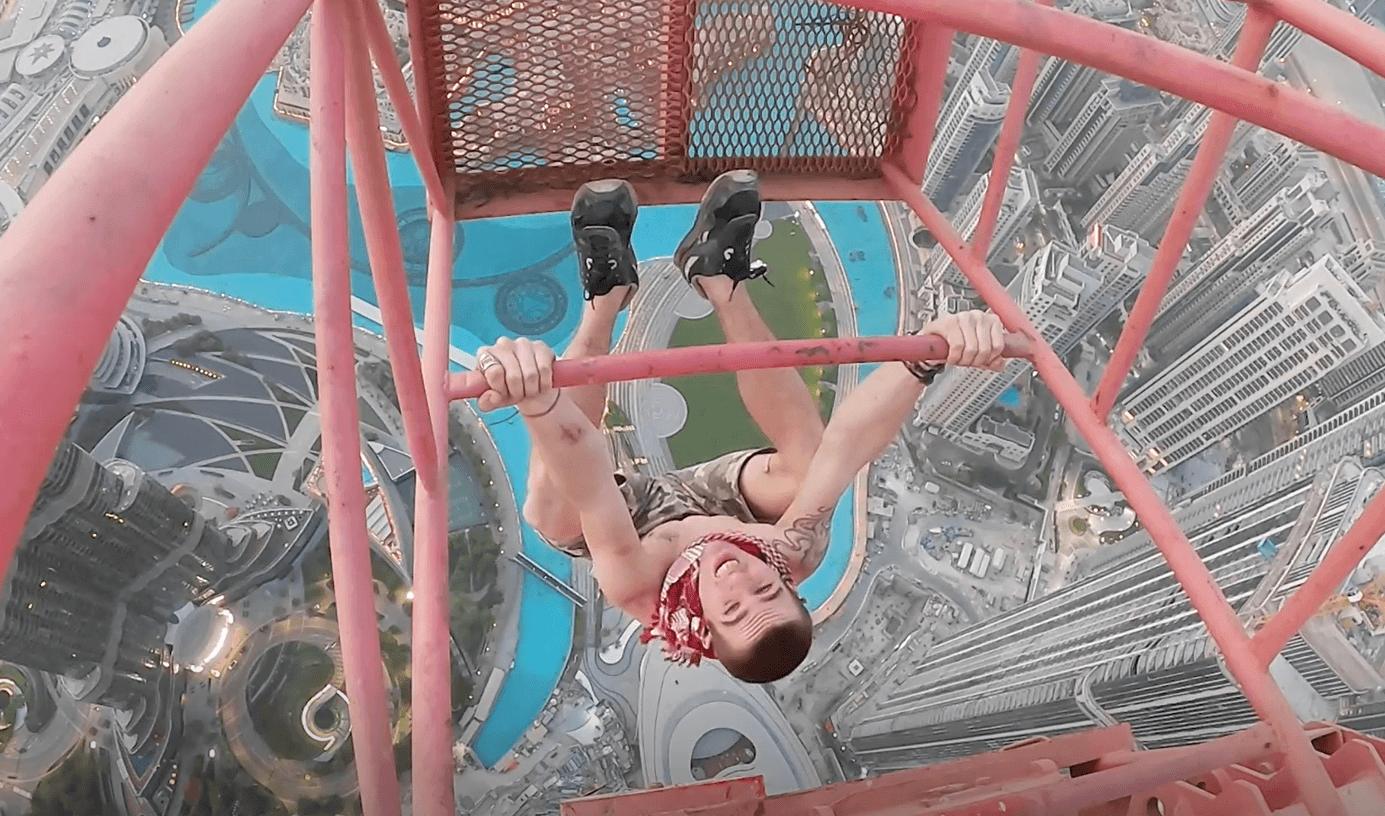Free climber didn’t know crane was covered in grease before hanging from top