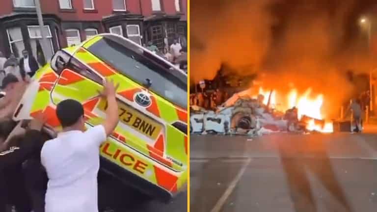 Police car turned over and bus set on fire amidst riots in Leeds Police car turned over and bus set on fire amidst riots in Leeds