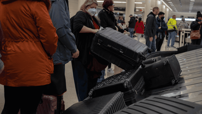 Woman dies after getting stuck in baggage carousel at major airport Woman dies after getting stuck in baggage carousel at major airport
