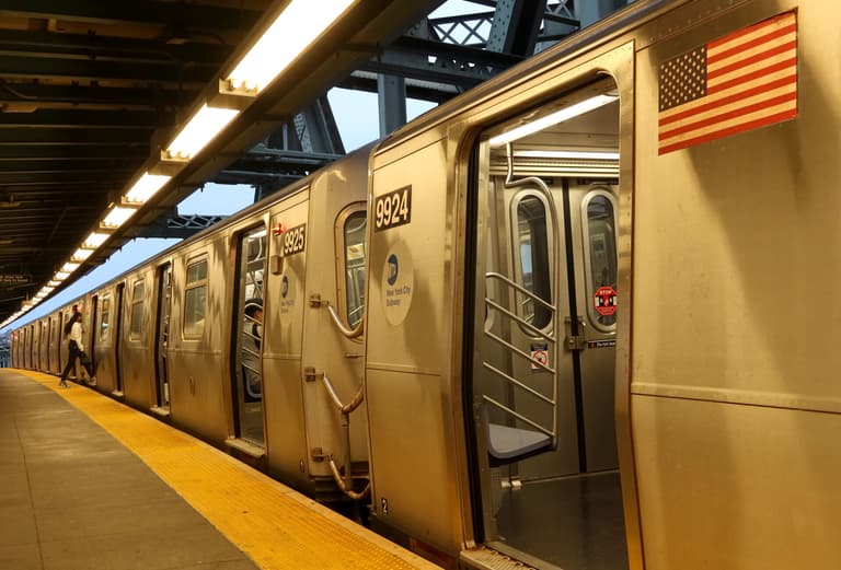Woman killed after being set on fire on subway train Woman killed after being set on fire on subway train