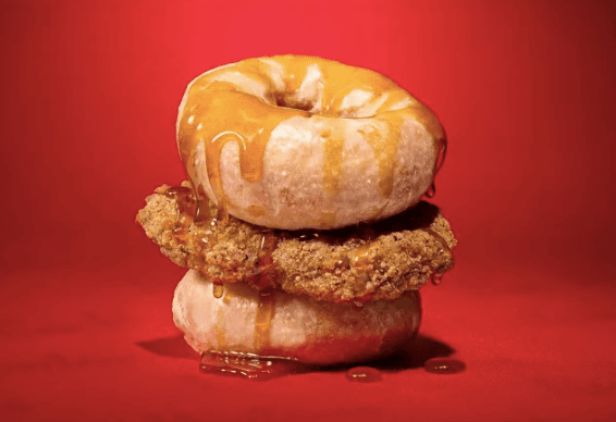 Fast food chain unveils ‘unhinged’ Chicken burger with doughnuts for buns Fast food chain unveils ‘unhinged’ Chicken burger with doughnuts for buns