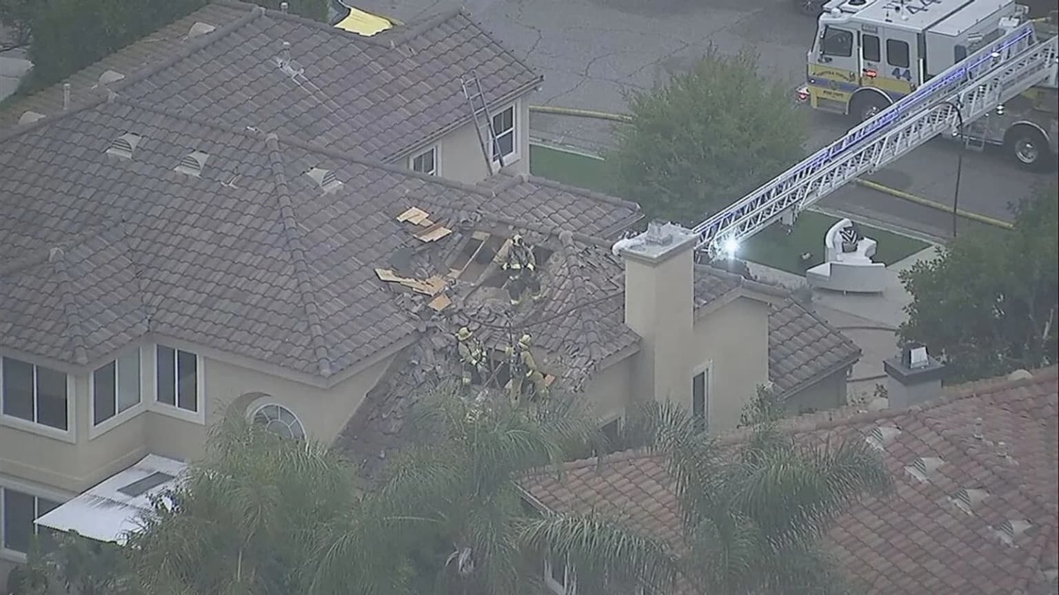 Small plane crashes into residential neighbourhood killing all onboard