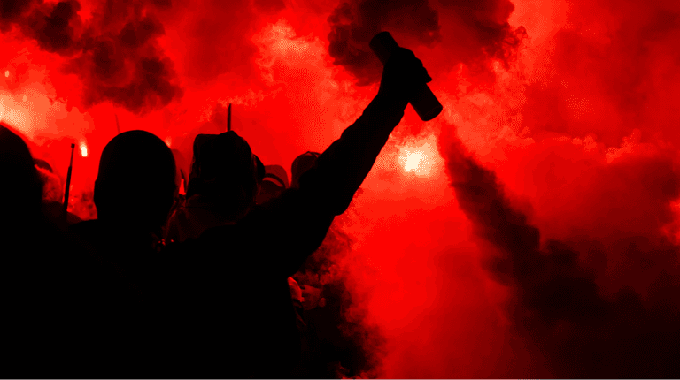 Football match abandoned over ‘barbaric’ fan violence as 100 spectators arrested Football match abandoned over ‘barbaric’ fan violence as 100 spectators arrested
