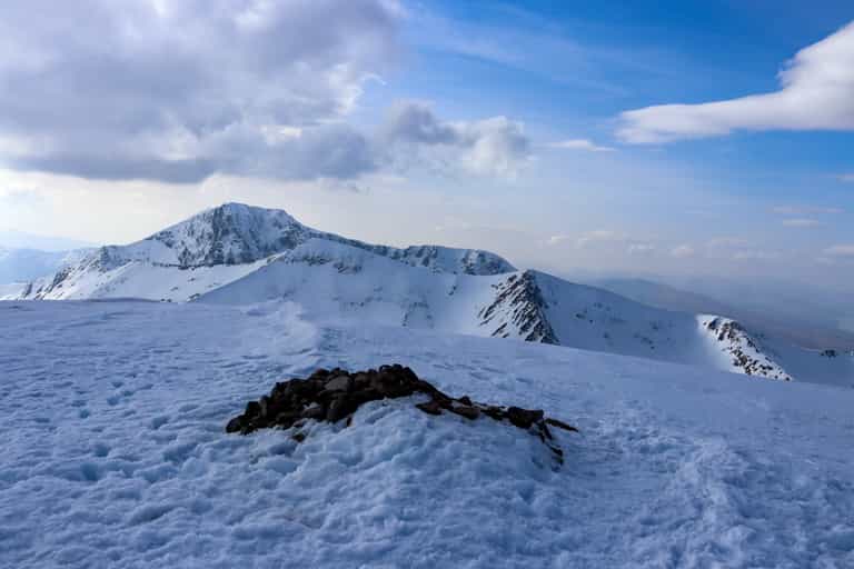 Skier dies after falling on 4,000ft UK mountain Skier dies after falling on 4,000ft UK mountain