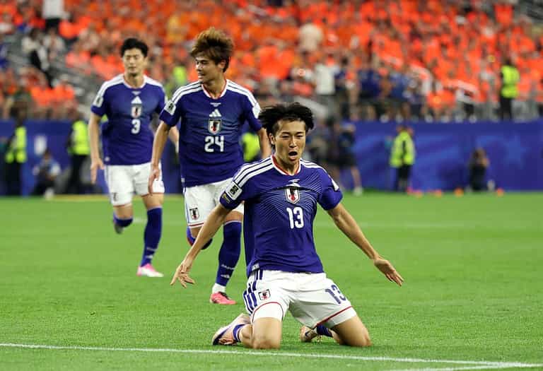 Why do Japan play in blue despite the colour not featuring on their flag Why do Japan play in blue despite the colour not featuring on their flag