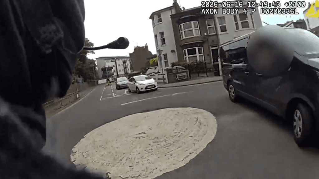 Watch incredible moment van driver helps armed police catch suspect