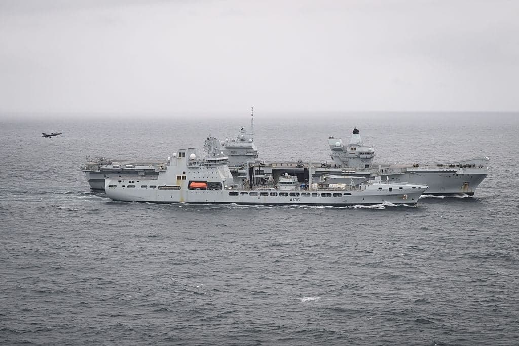 Jets scrambled to intercept Russian plane ‘dropping devices’ near UK flagship carrier