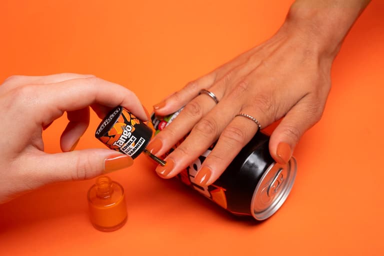 Tango creates edible nail varnish to help Glastonbury fans through nail-biting ticket scramble Tango creates edible nail varnish to help Glastonbury fans through nail-biting ticket scramble