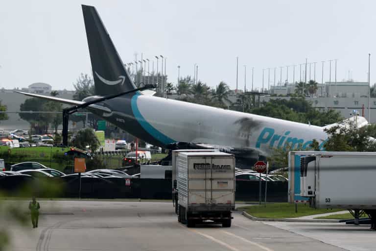 At least five people dead after Amazon cargo plane overshoots runway at US airport At least five people dead after Amazon cargo plane overshoots runway at US airport