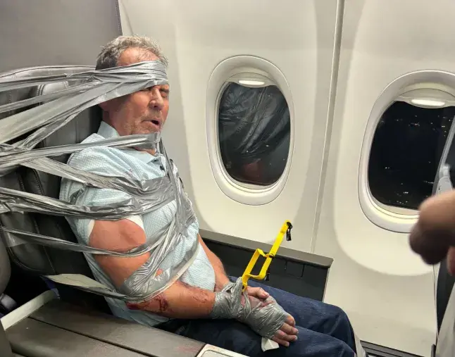 Man loses job after being duct taped to seat following ‘racist outburst’ on flight Man loses job after being duct taped to seat following ‘racist outburst’ on flight