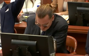 Johnny Depp reacts after Amber Heard’s lawyer impersonates his voice in court