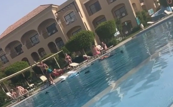 Man caught cheating in Ibiza humiliated by girlfriend who gets dramatic poolside revenge