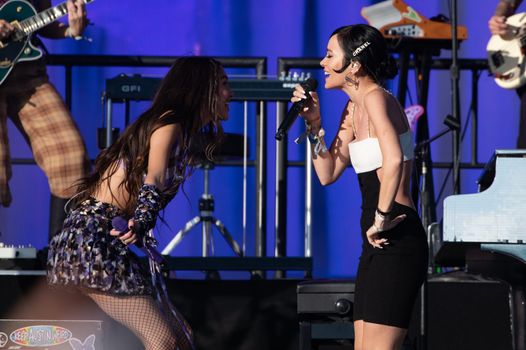 GLASTONBURY, ENGLAND - JUNE 25: Olivia Rodrigo and Lily Allen perform on the Other stage during day four of Glastonbury Festival at Worthy Farm, Pilton on June 25, 2022 in Glastonbury, England. (Photo by Joseph Okpako/WireImage)