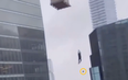 Terrifying video shows screaming construction worker dangling from crane hundreds of feet in the air