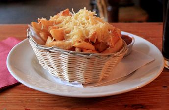 Chip shop sparks fury after charging £2… for the cheese on ‘cheesy chips’