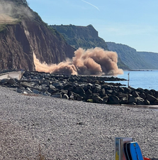 Dramatic moment cliff collapses on UK beach as hot weather scorches rocks