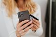 Woman takes out full-page ad to get back at cheating husband – and uses his credit card to pay for it