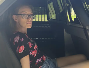 Woman arrested for murder after inmate dies following visitation kiss