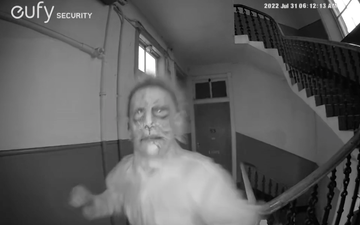 Woman shares scary clip of dancing ‘nightmare neighbour’ who ‘carved X on her door’
