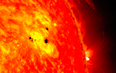 Scientists warn that planet-sized sunspot directed at Earth has grown tenfold
