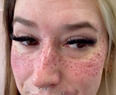 Tattoo artist shows of freckle inkings she did for happy customer who travelled 900 miles for appointment
