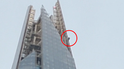 Topless man spotted free climbing to the top of The Shard