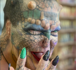 Body mod enthusiast says son rejected her after she became the world’s first ‘dragon’ person