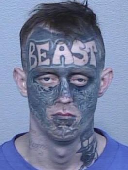 Jaimes Sutton with tattoo ink all over his face and "BEAST" tattooed on his forehead (Image: NSW Police)