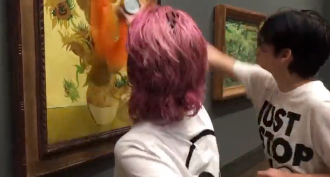 Woman who threw soup over Van Gogh's 'Sunflowers' says she never try to damage it