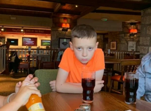 Camera-shy boy couldn’t be more against having his school photo taken