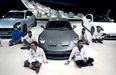 Climate activists glue themselves to floor of car dealership – but complain when staff turn off the lights and go home