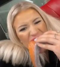 People are horrified after woman eats raw salmon on the bus
