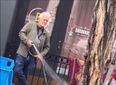 Gallery owner arrested after he was filmed spraying homeless woman with hose