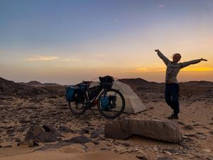 Adventurer says getting caught up in Sudanese civil war won’t derail her dream of cycling the world