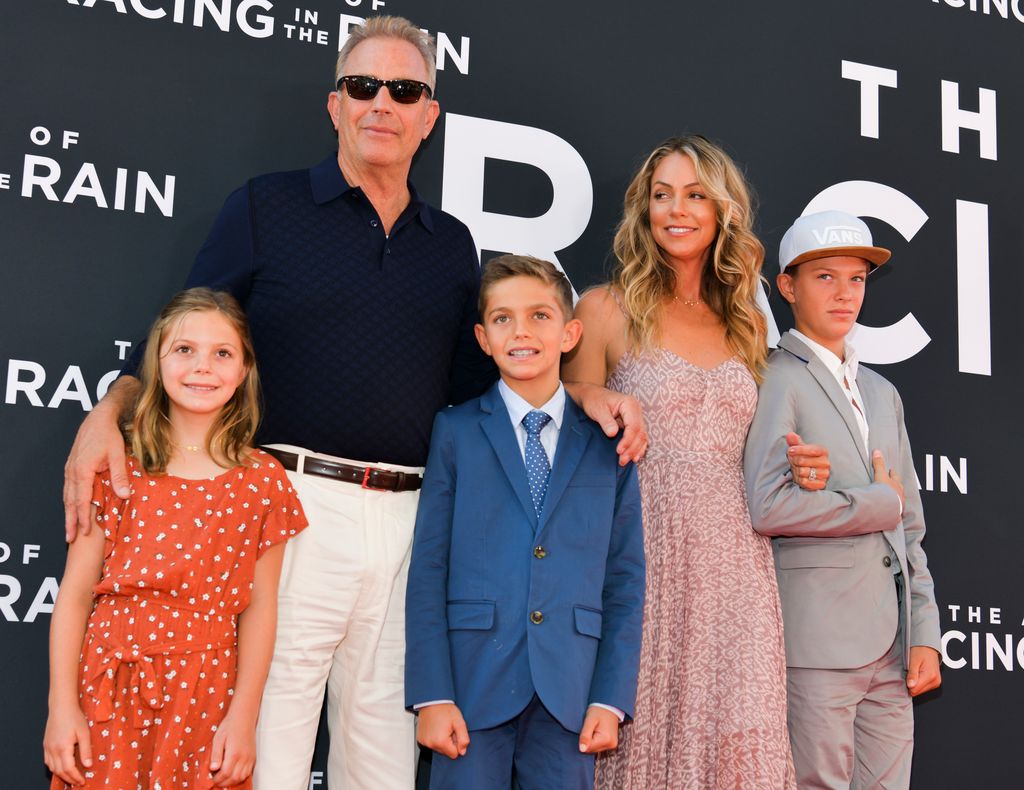 Kevin Costner, Christine Baumgartner and their three children (Getty)