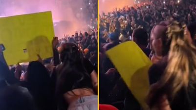Woman who paid £570 to see Drake tears down fan’s sign blocking her view