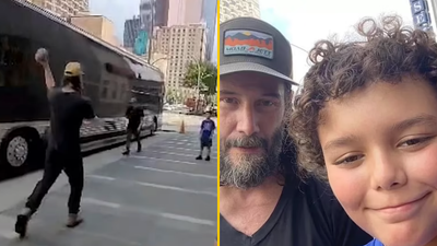 Keanu Reeves pictured playing catch with a nine-year-old boy