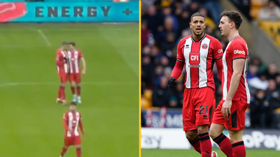 Sheffield United’s Vinícius Souza and Jack Robinson clash with each other after Wolves goal