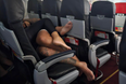 Plane passengers baffled by couple sitting incredibly close to each other