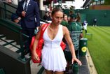 Tennis player plays Wimbledon match wearing wedding dress