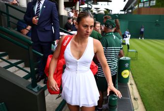 Tennis player plays Wimbledon match wearing wedding dress