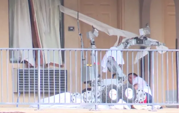 The moment police robot tear-gasses man and runs him over