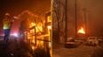 Man arrested on suspicion of starting LA wildfire that has burned over 1,000 acres