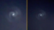 Glowing spiral orb spotted in UK night sky leaving Brits baffled