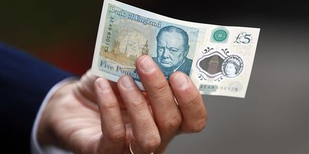 Bags of cash fall from security truck with dozens of people picking up £225,000