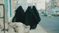 Kazakhstan bans face coverings as it urges women to embrace ‘national style’