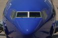 US airplane plummets hundreds of feet to avoid fighter jet, injuring two