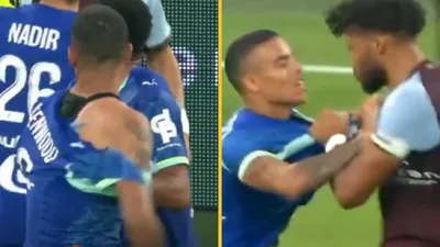Mason Greenwood has shirt ripped by Tyrone Mings during heated moment